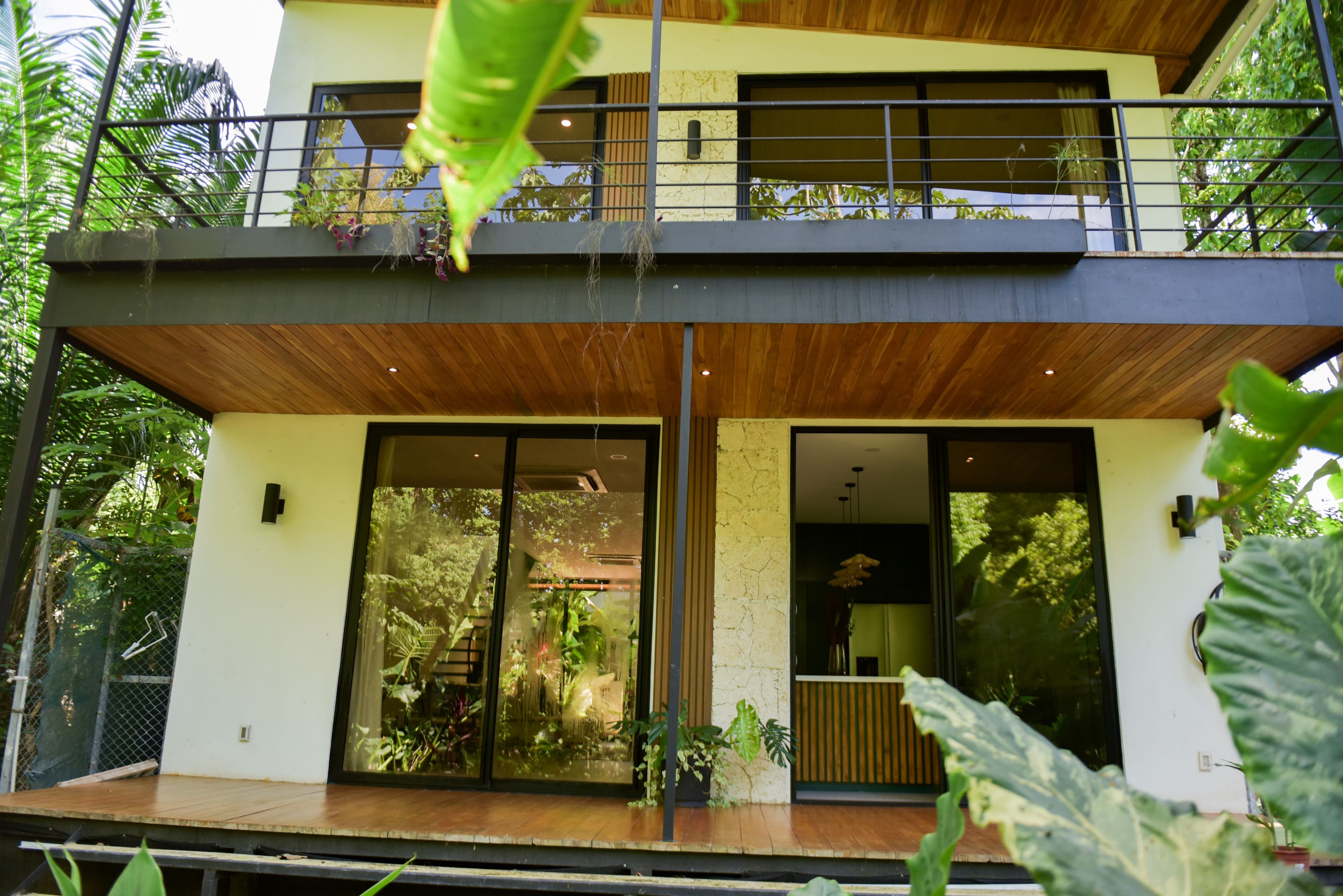 Back patio with tropical garden surroundings