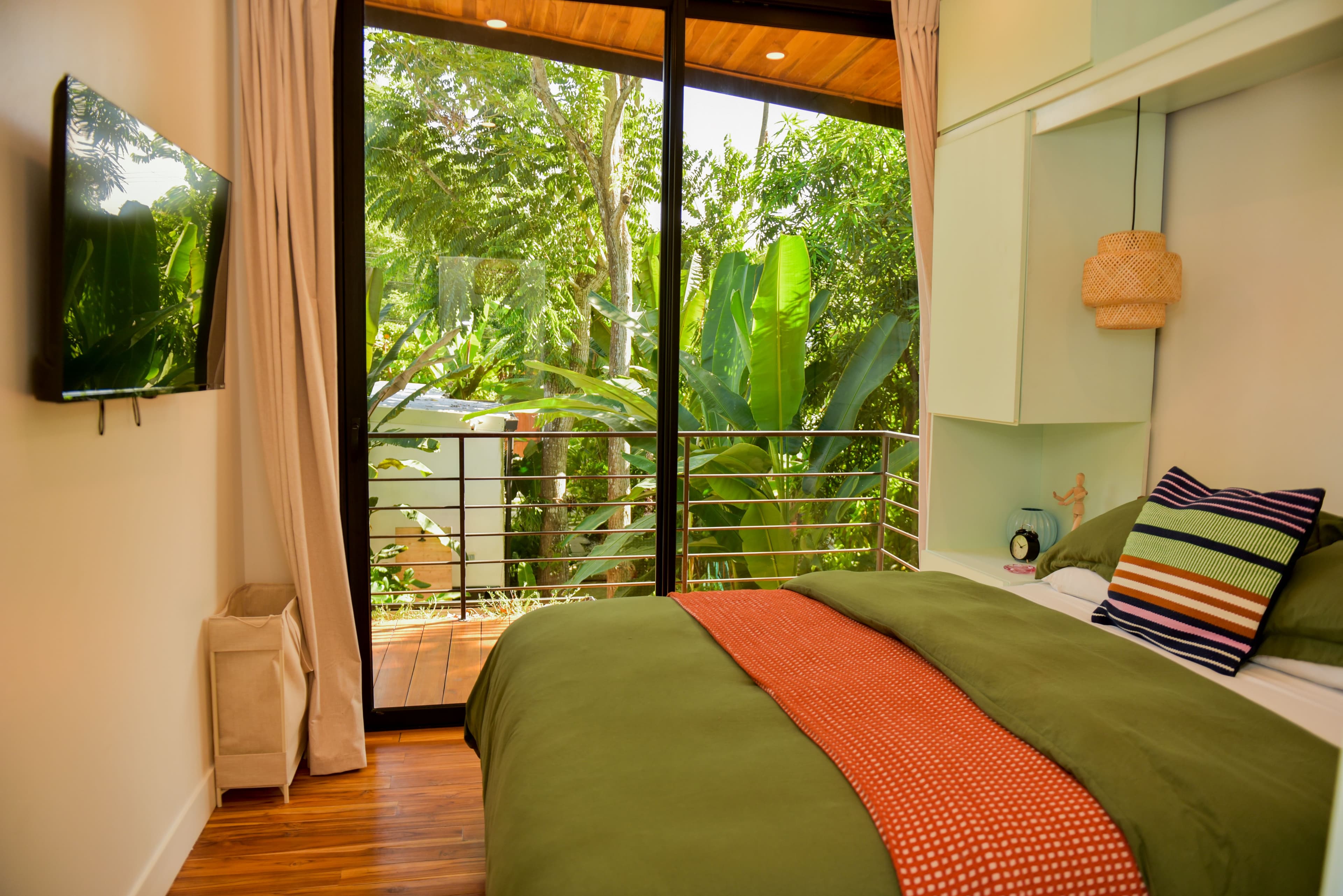 Front bedroom with built-in storage and en-suite access