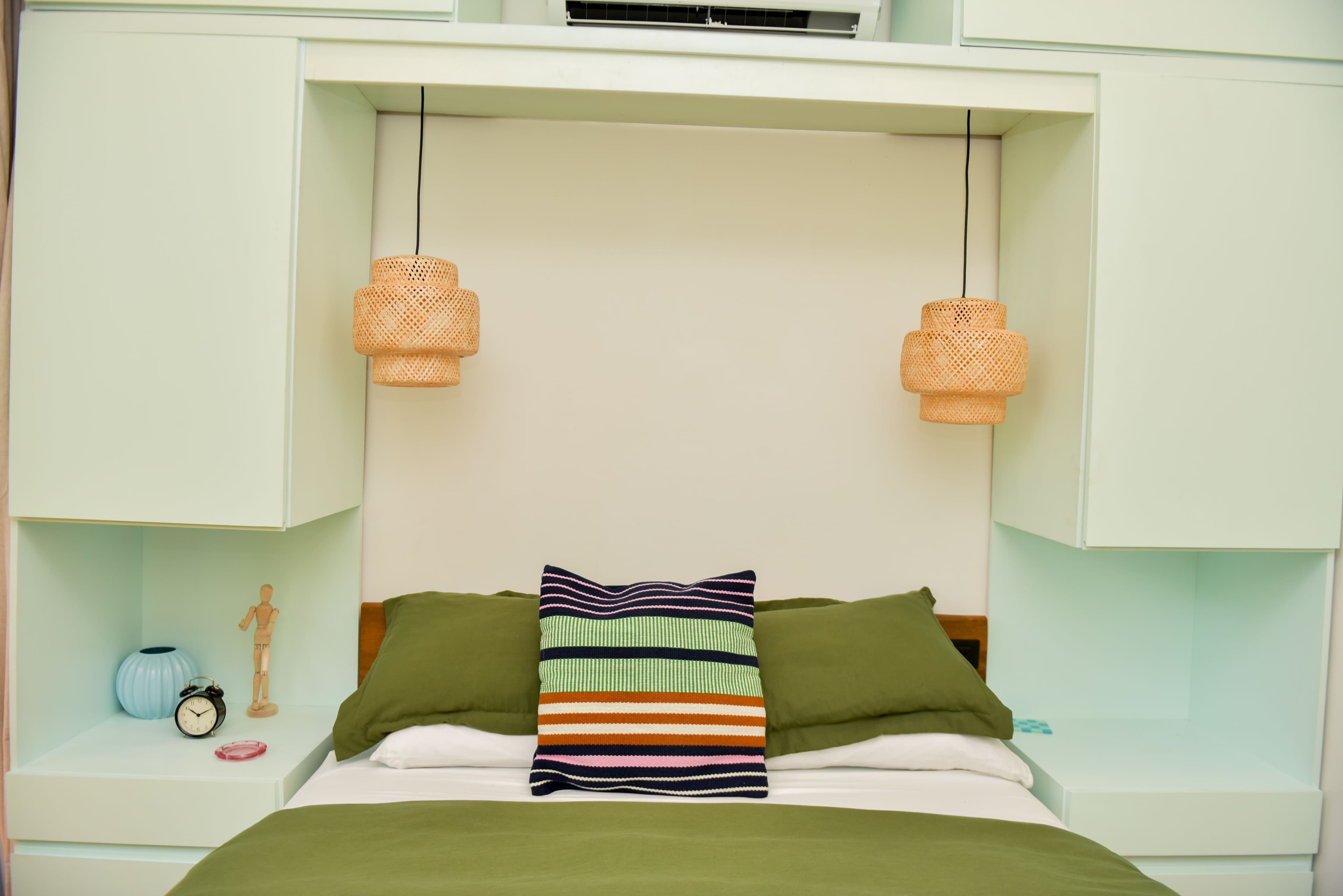 Front bedroom with balcony doors and queen bed