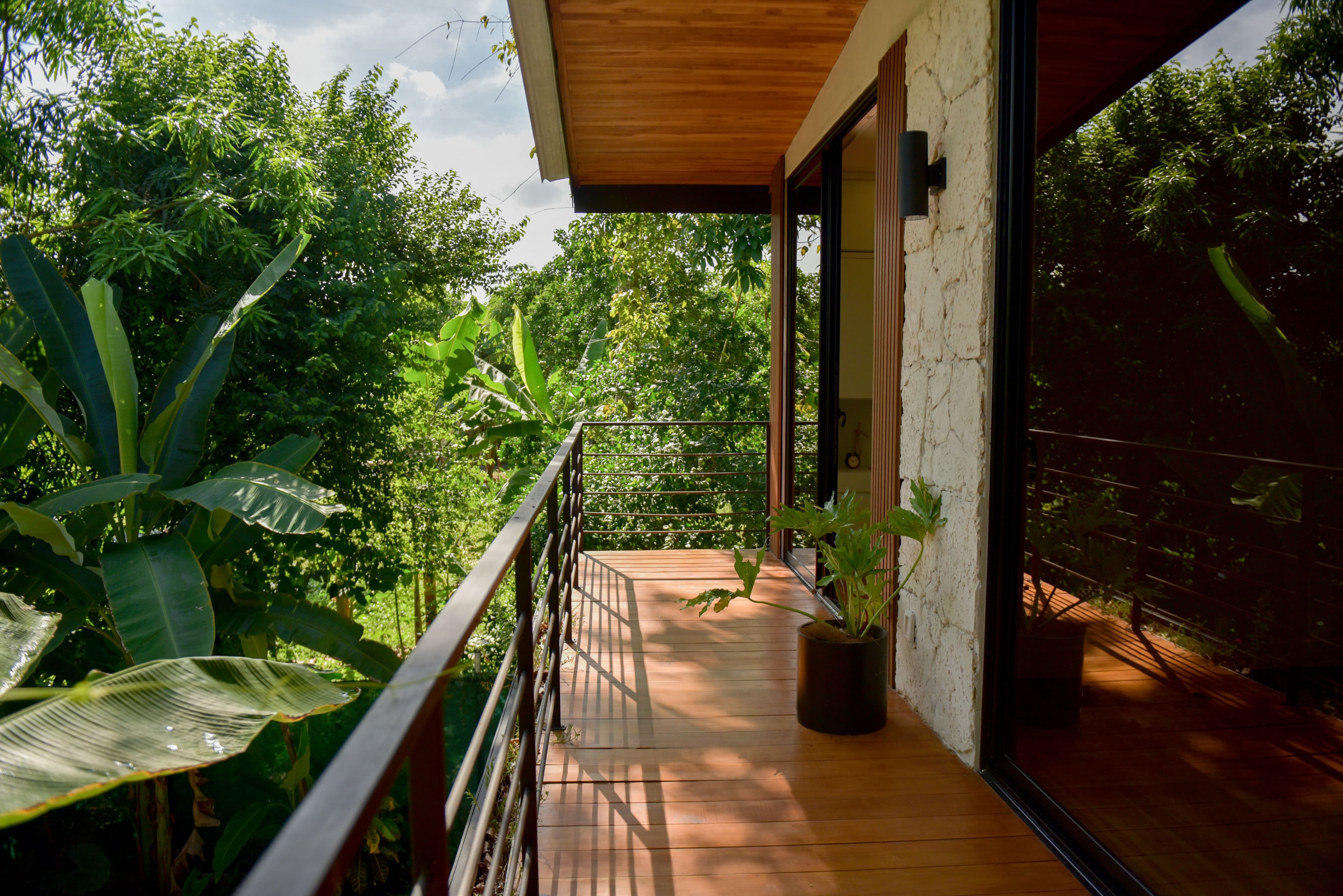 Front bedroom upper balcony with tropical views