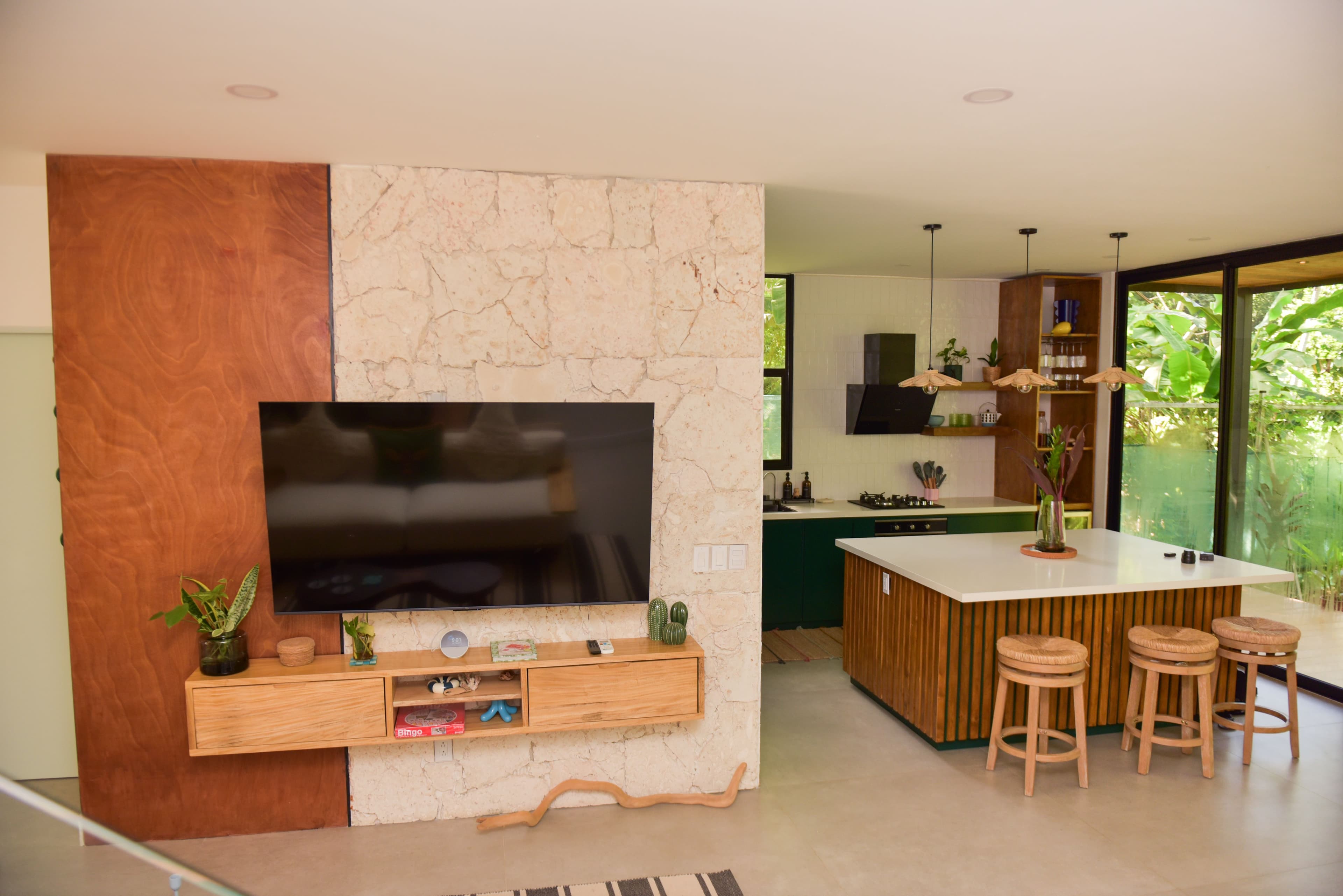 Living room with television wall and open-concept layout
