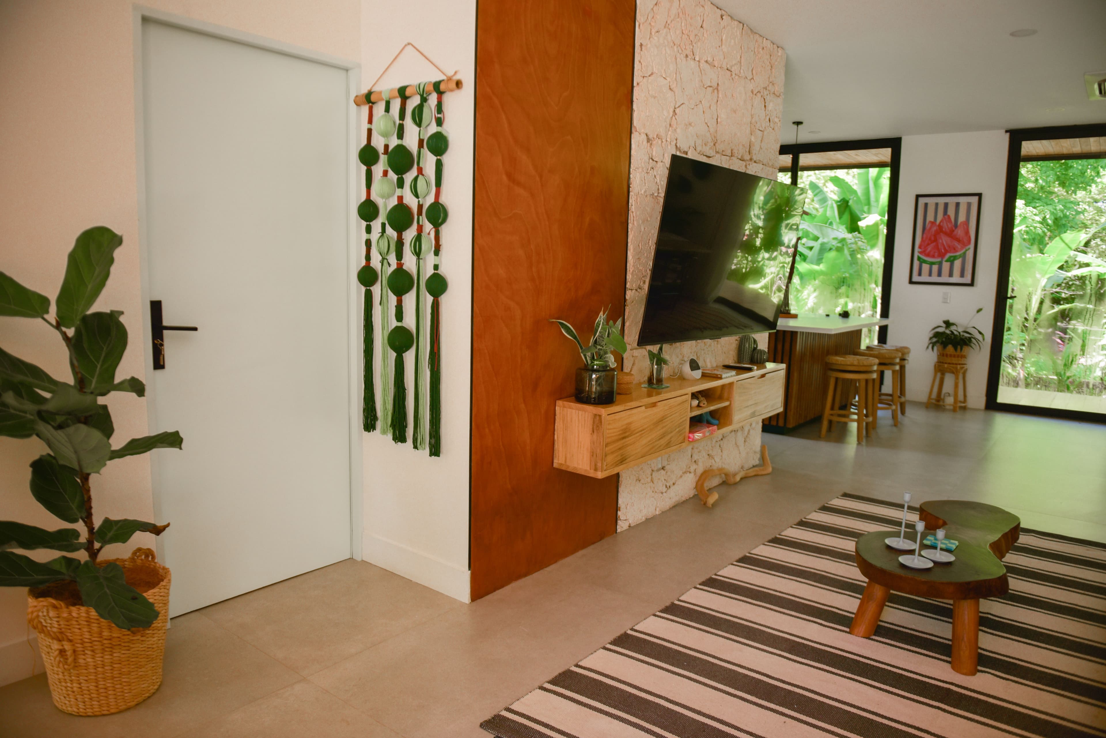 Living room sofa, seating area, and glass doors to the terrace