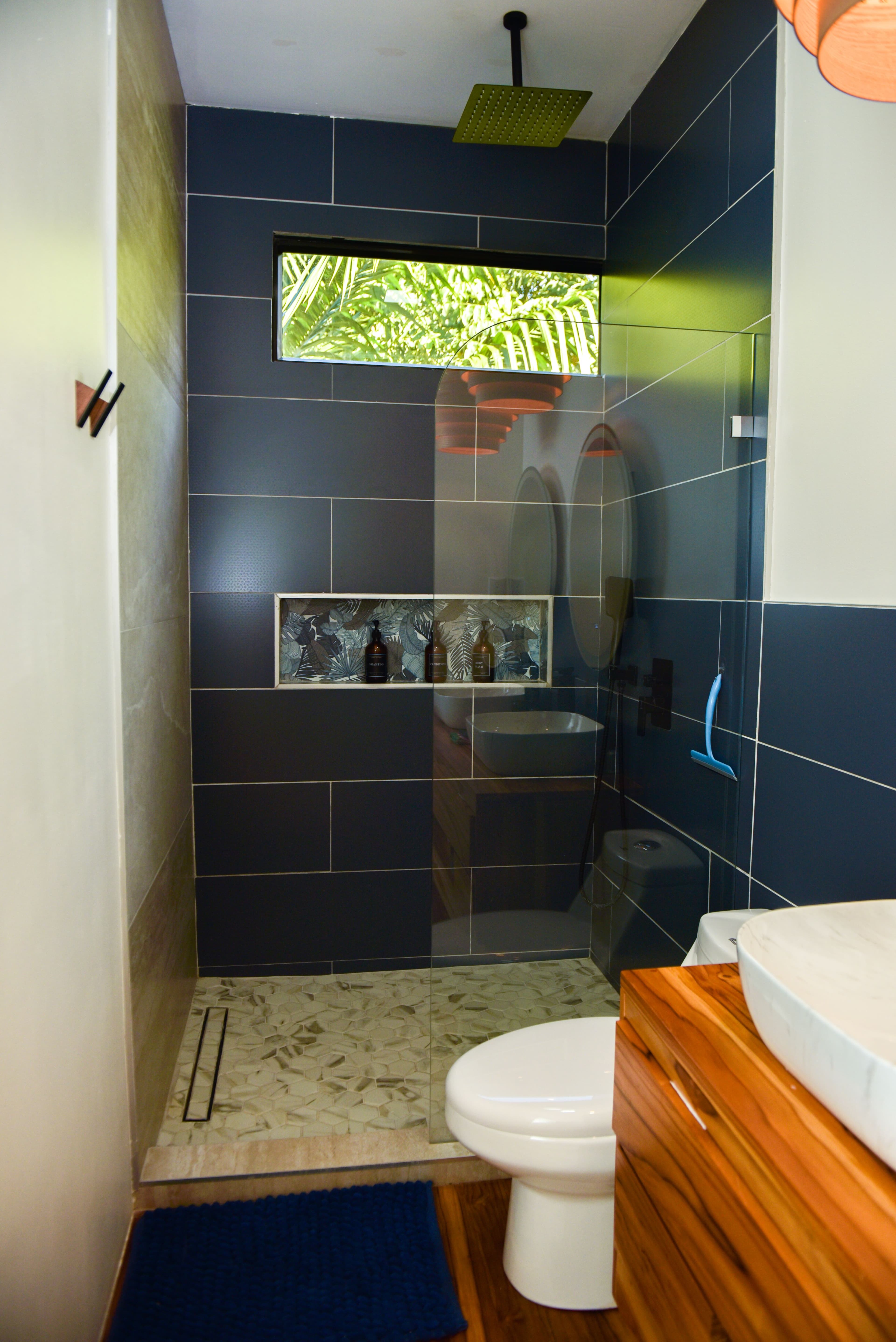 Main bedroom private bathroom shower and vanity