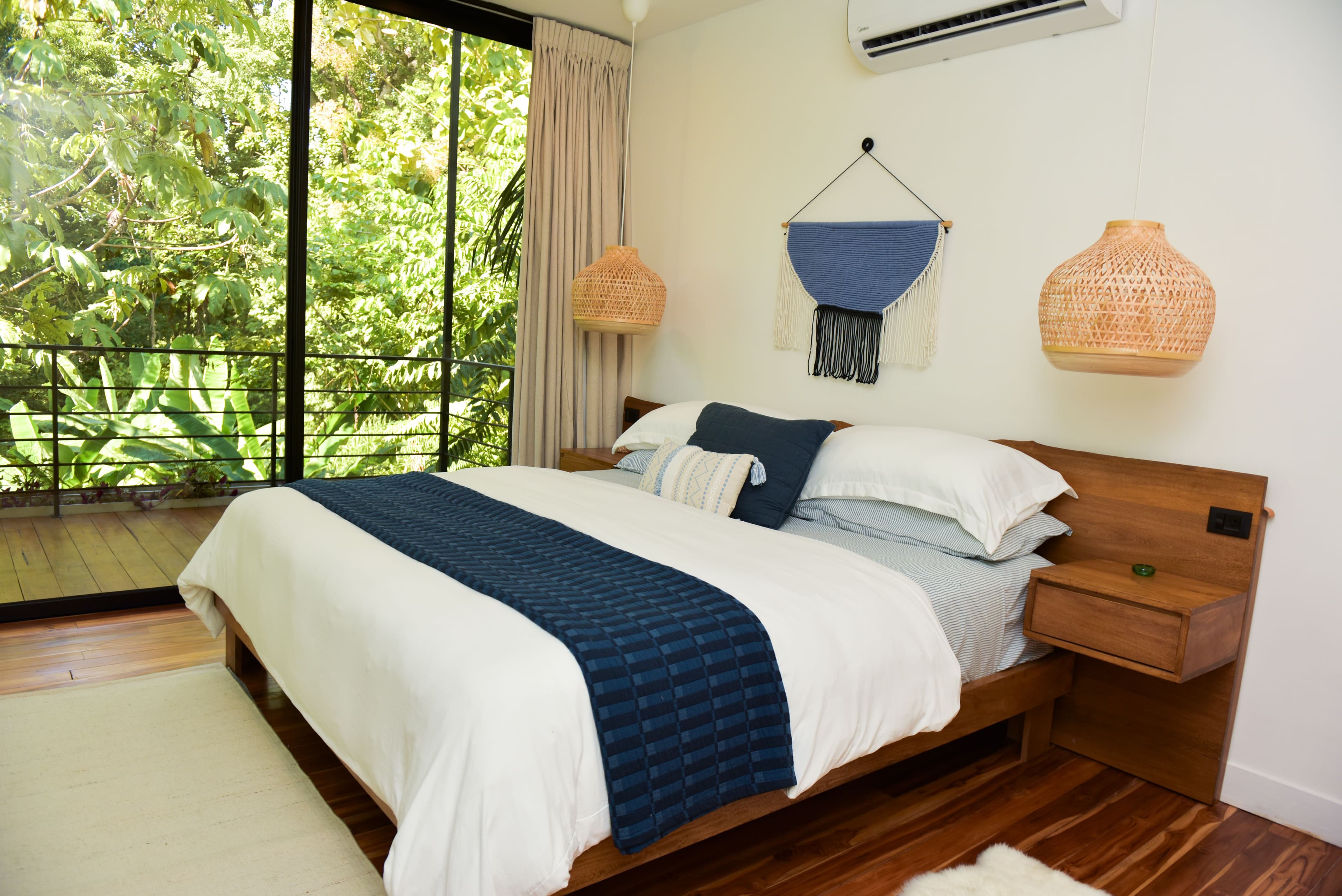 Main bedroom with king bed and private suite details