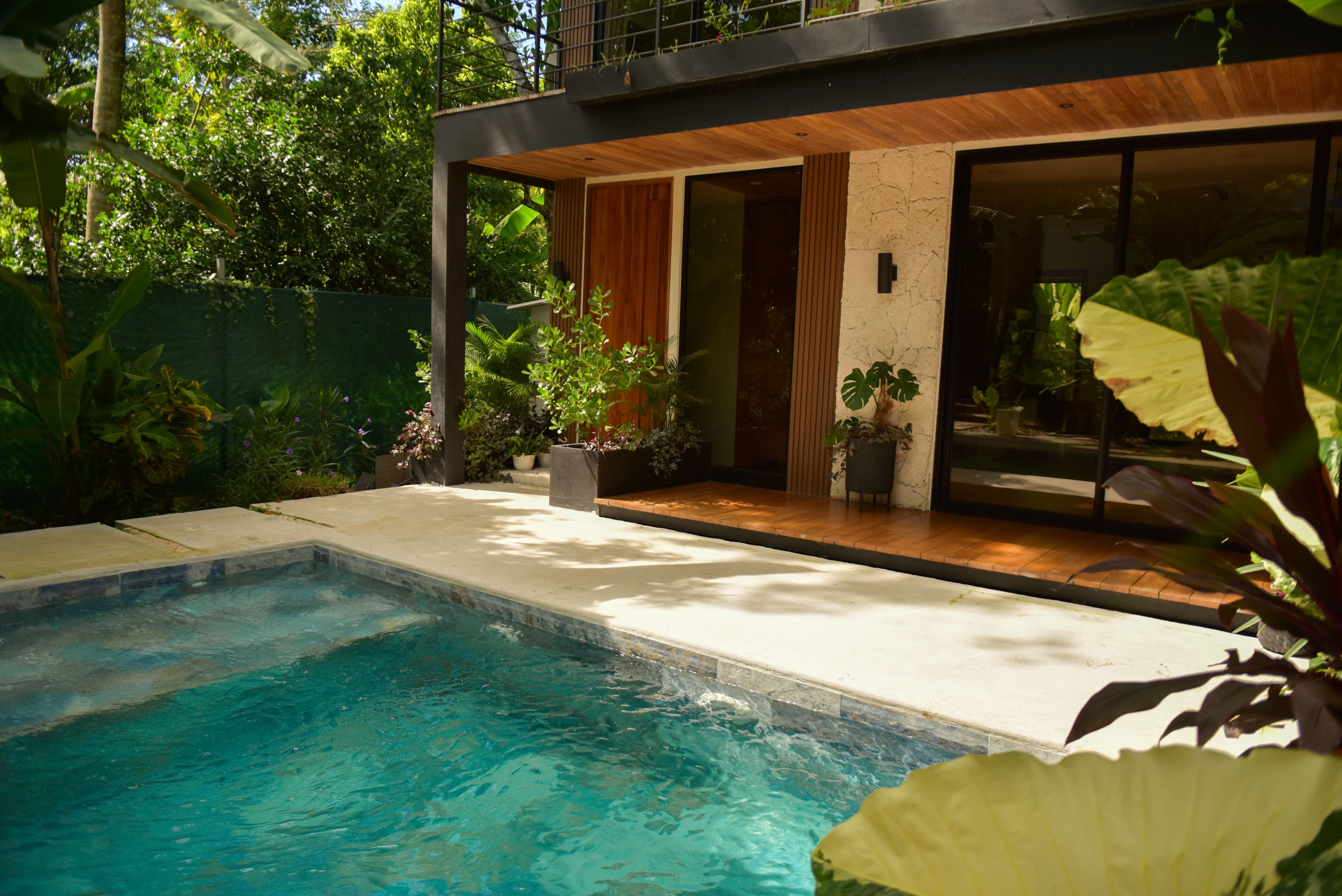 Shared pool and outdoor living space at Riu House